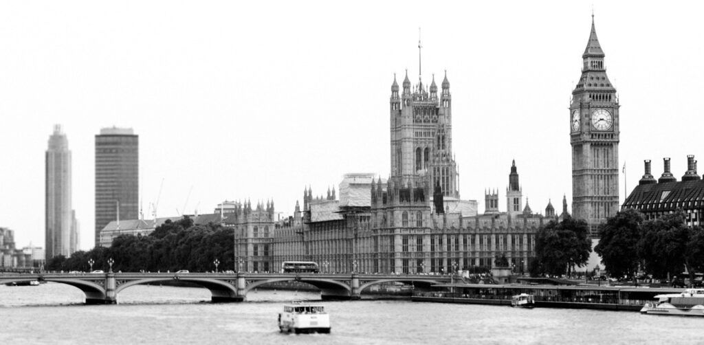 Houses of parliament next to the river thames in London UK